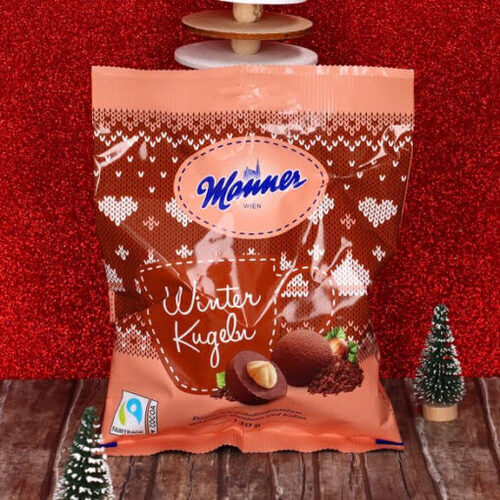 Manner Winter Kugeln karácsonyi kakaós golyók egész mogyoróval 120g